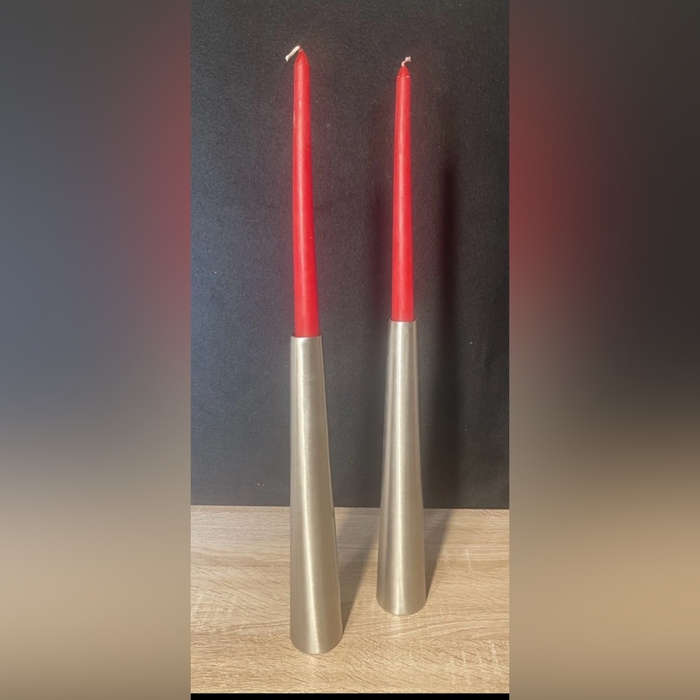 Elegant pewter taper candle holders by West Elm .